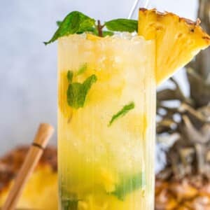 A pineapple mojito in a glass.