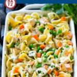 A dish of chicken noodle casserole with a creamy sauce.