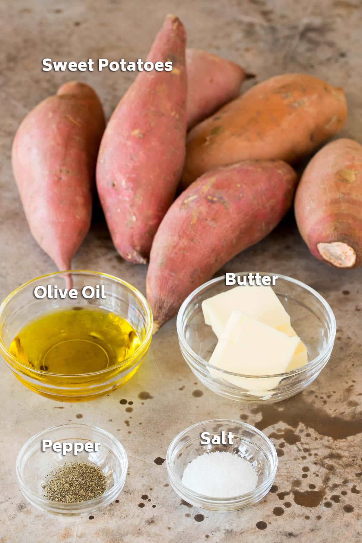 Ingredients including sweet potatoes, butter, olive oil, salt and pepper.