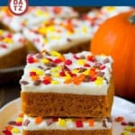 These pumpkin bars are light and fluffy cake bars made with pumpkin puree and spices, then topped with a layer of cream cheese frosting and sprinkles.