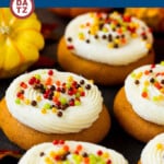 These soft pumpkin cookies bake up light and fluffy, and are topped with a decadent cream cheese frosting and colorful sprinkles.