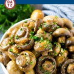 These roasted mushrooms are drizzled with a garlic and herb butter, then baked at high heat until tender.