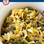This slow cooker beef stroganoff is tender beef, mushrooms and egg noodles, all tossed in a savory creamy sauce.