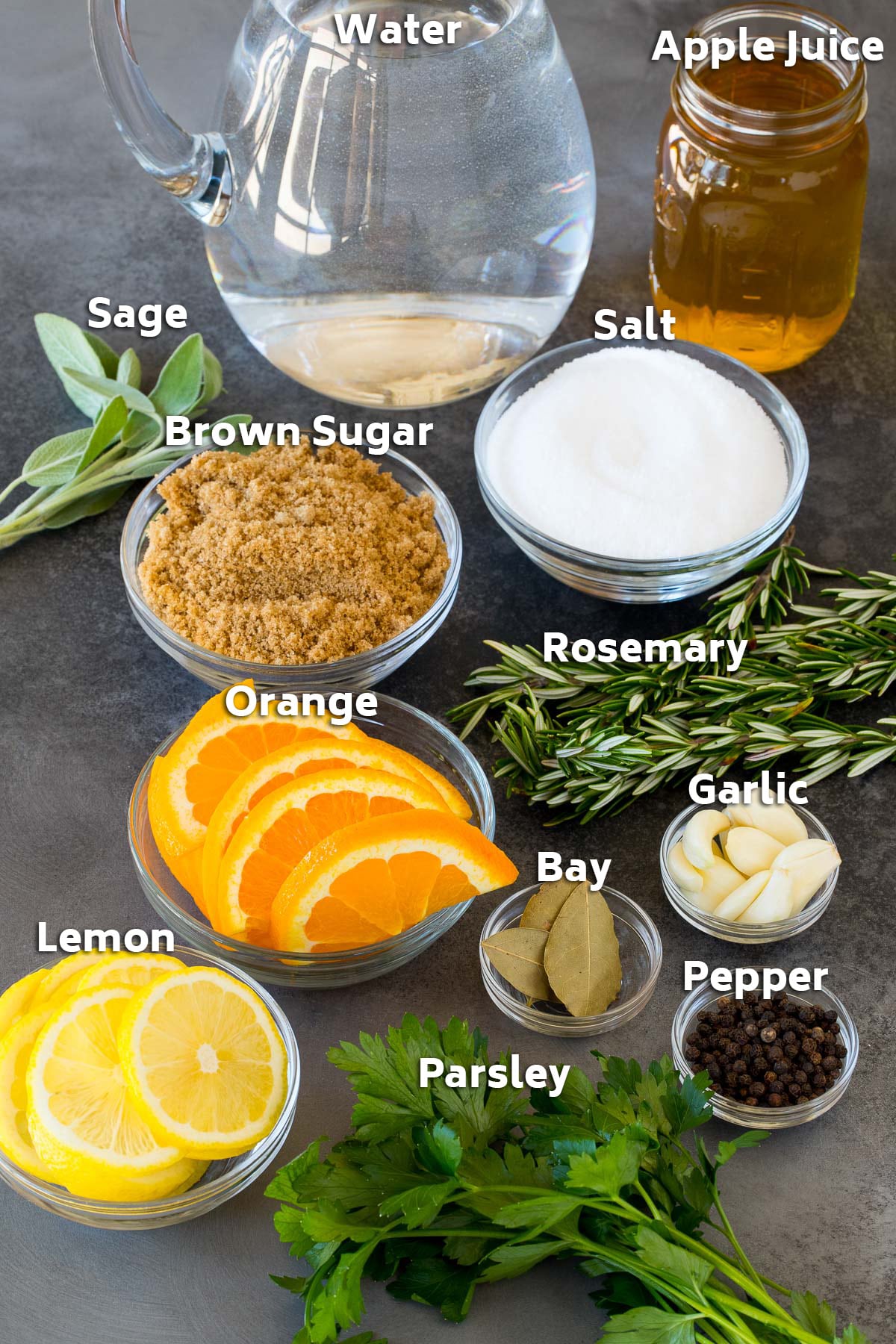 Bowls of ingredients including salt, sugar, water, citrus and herbs.
