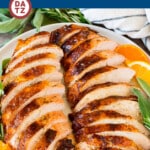 This grilled turkey breast is soaked in flavorful brine, then coated in garlic and herbs and grilled to tender perfection.