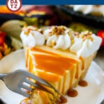This no bake pumpkin cheesecake recipe is a graham cracker crust topped with a rich and creamy pumpkin filling.