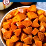 These easy roasted sweet potatoes are tossed in maple cinnamon butter and cooked until caramelized and tender.