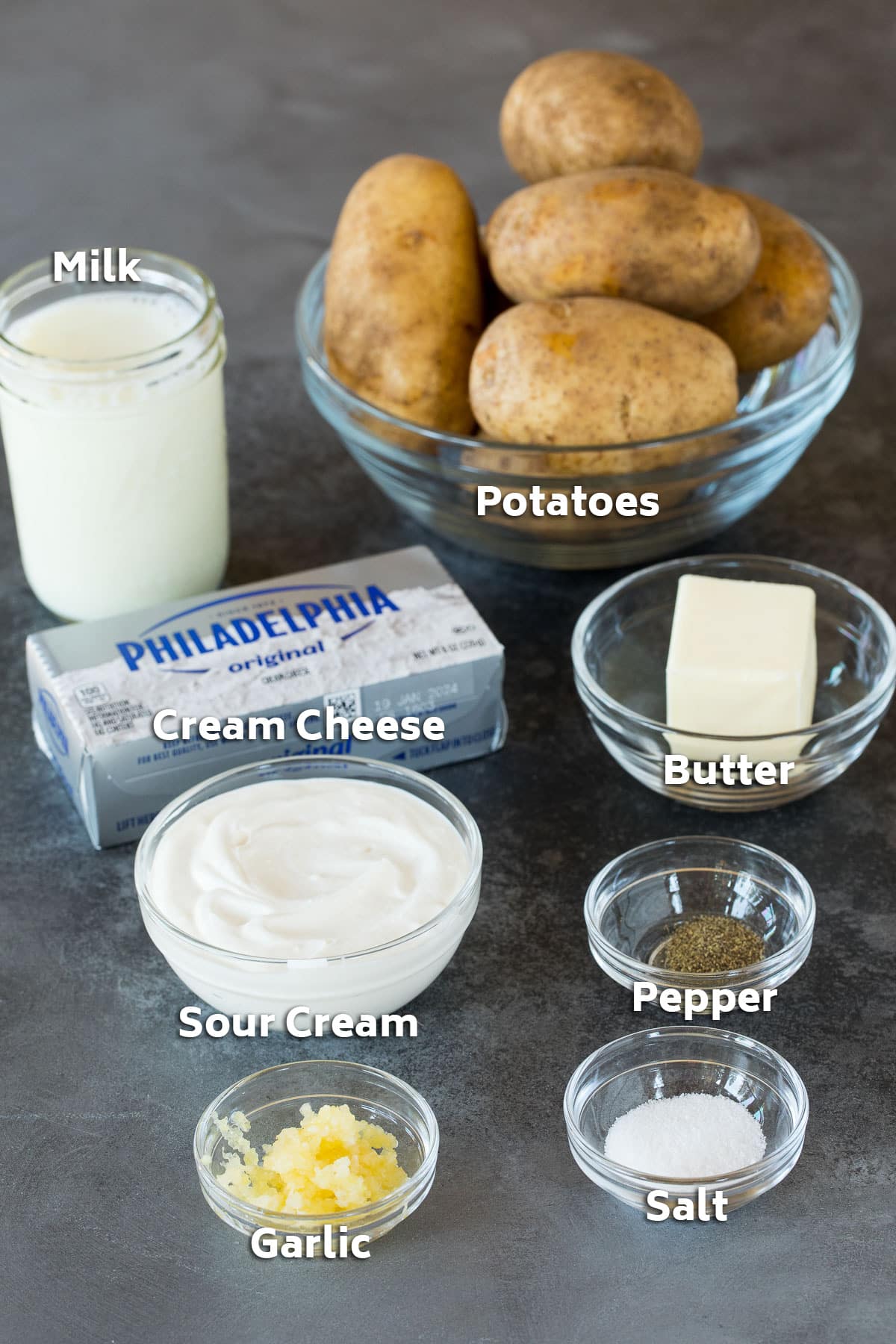 Ingredients including potatoes, cream cheese, sour cream, butter and seasonings.