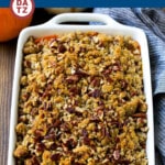 This sweet potato casserole with pecans is lightly sweetened mashed sweet potatoes topped with a crunchy brown sugar pecan streusel.