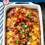 This breakfast casserole with bacon recipe is loaded with eggs, cheese and bacon, then finished off with an avocado and tomato topping.
