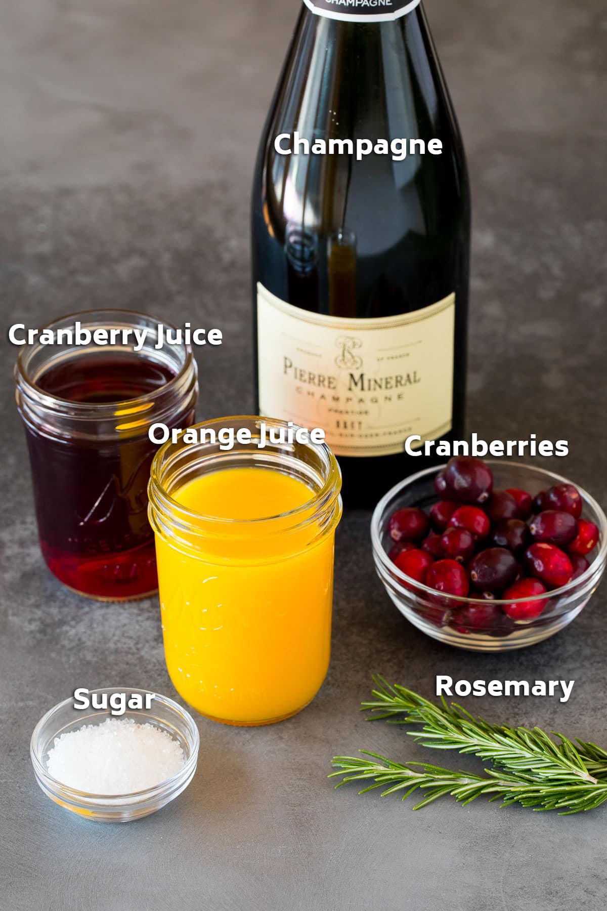 Ingredients including champagne, cranberries, fruit juices and sugar.
