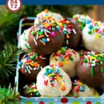 This recipe for Oreo balls is Oreo cookie filled truffles dipped in chocolate, then decorated in a variety of sprinkles.