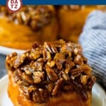 Sticky buns with a caramel pecan glaze ready to eat.