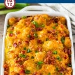 This tater tot breakfast casserole is made with bacon, eggs, veggies, potato tots and plenty of cheese, all baked together to create a hearty and delicious meal.