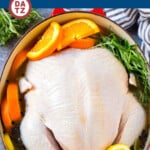 A turkey in brine with citrus and herbs.