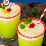 This Grinch punch is a fun and festive drink made with fruit juices, lemon lime soda and sherbet.