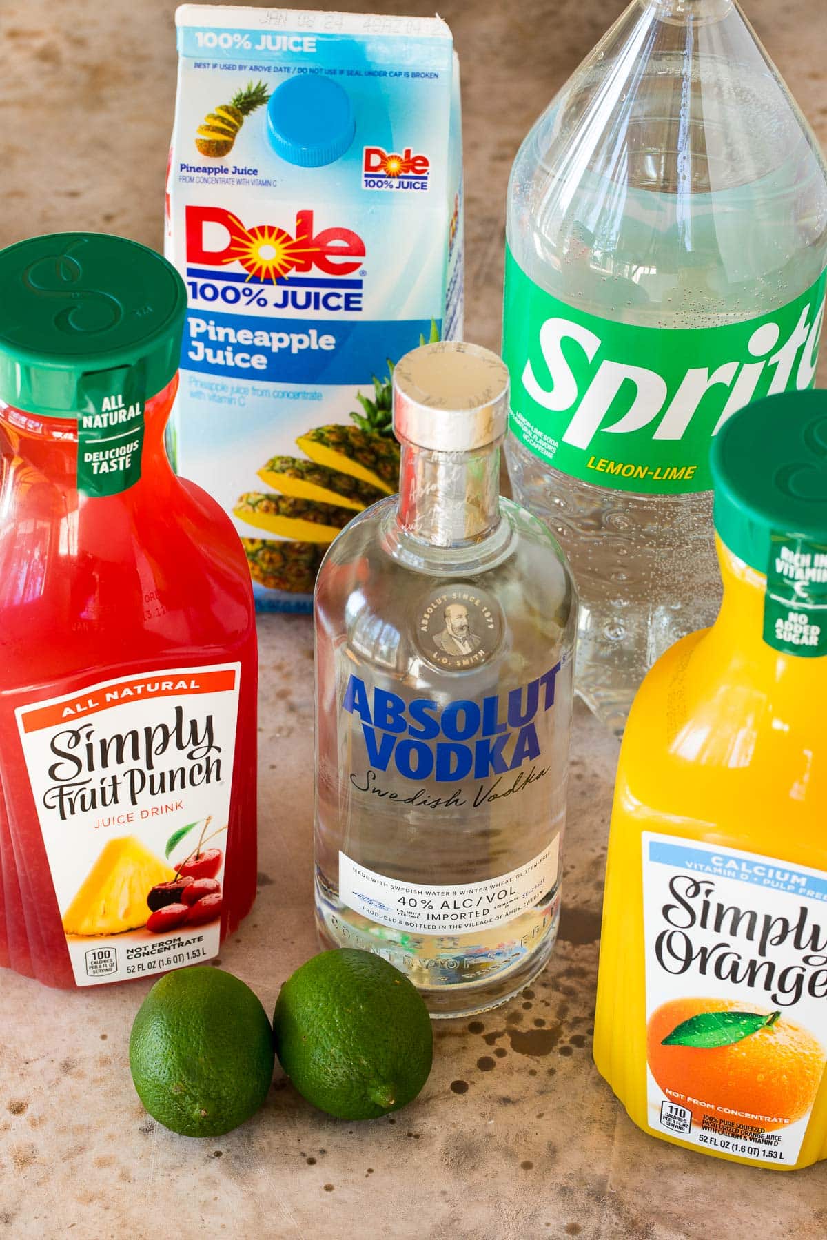 Bottles of juices, soda and vodka.