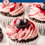 These black forest cupcakes are homemade chocolate cakes filled with cherries, then topped with a cherry buttercream frosting.