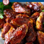 These smoked chicken wings are coated in a sweet and savory spice rub then smoked until tender.