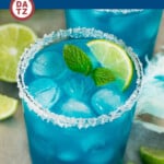 This blue margarita is tequila, blue curacao, lime juice and agave syrup, all shaken together to form a beautiful and unique cocktail.