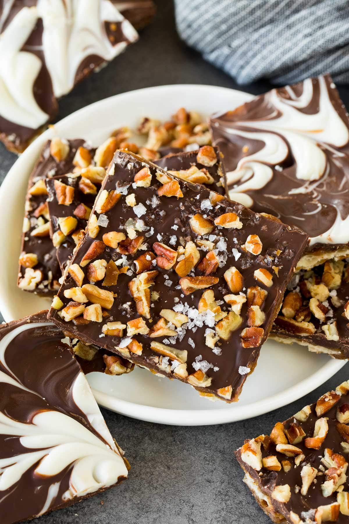 A plate of two different flavors of matzo crack.