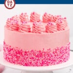 This pink cake is layers of fluffy pink velvet cake with a Swiss meringue buttercream and plenty of festive sprinkles.