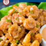 These bang bang shrimp are tender shrimp deep fried to golden perfection, then tossed in a creamy sweet chili sauce.